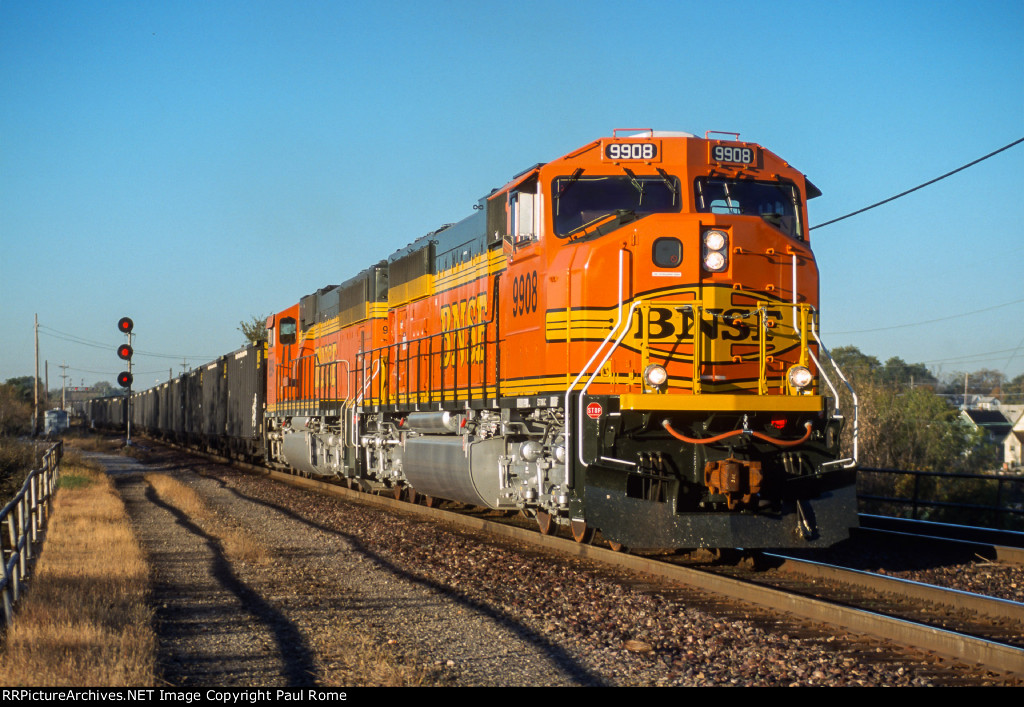 BNSF 9908, EMD SD70MAC, two new MACs lead an eastbound coal train 